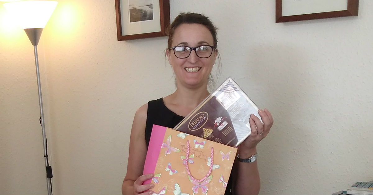 Jo receives a lovely box of chocolates from another very happy client